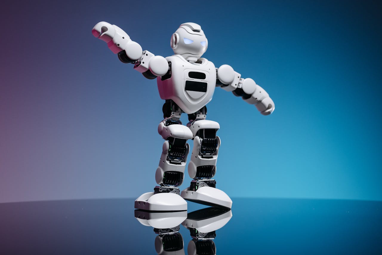 services-03 A futuristic white robot toy standing on a reflective surface with a gradient background.